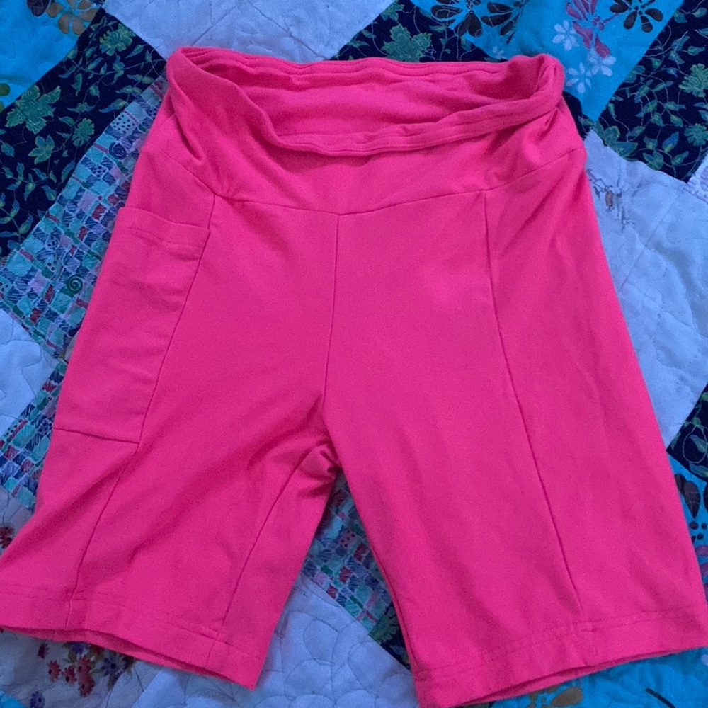 bright pink biker shorts with pocket on side!